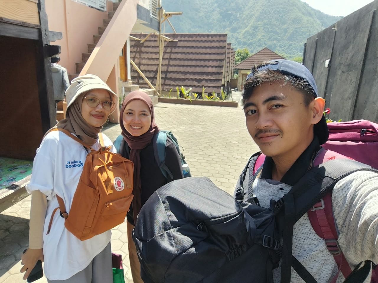 Adventures at the foot of Mount Rinjani surrounded by majestic mountain ridges.